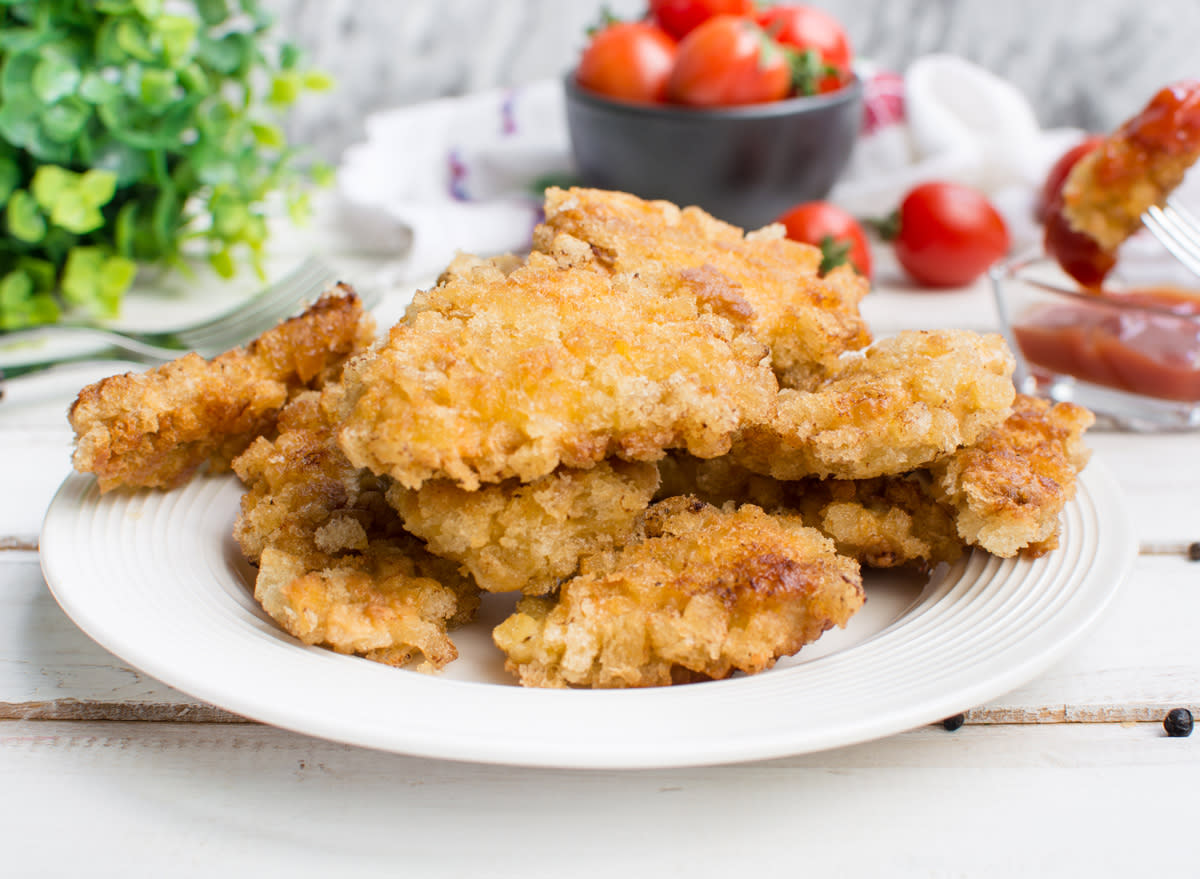 Cubed breaded and baked chicken nuggets