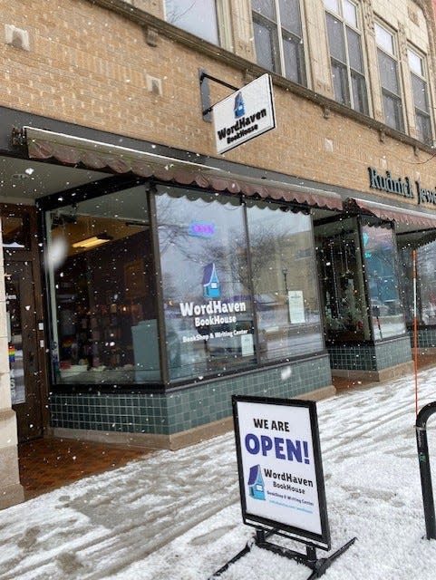 The exterior of WordHaven BookHouse seen on a snowy winter day.