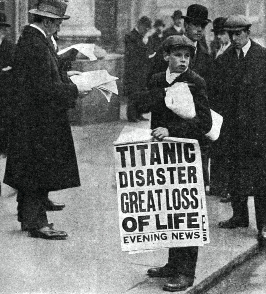 A little boy holding a newspaper that reads "Titanic Disaster Great Loss of Life"