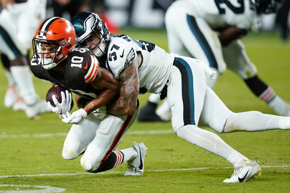 Cleveland Browns wide receiver Anthony Schwartz (10) runs for a first down in front of Philadelphia Eagles linebacker Ben VanSumeren (57) during the second half of an NFL preseason football game Thursday, Aug. 17, 2023, in Philadelphia. (AP Photo/Chris Szagola)