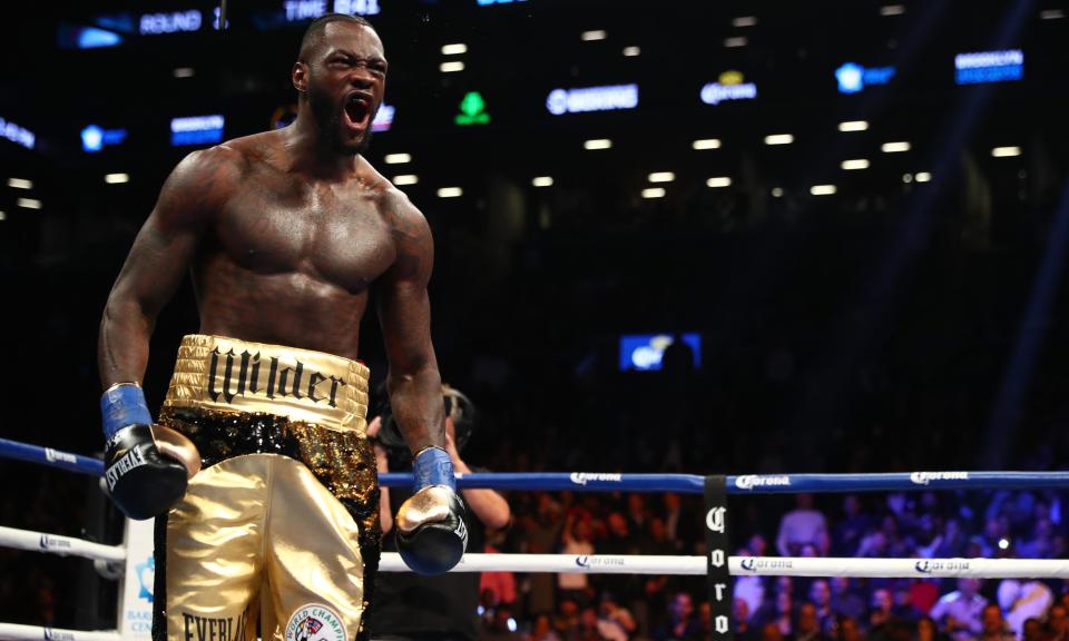 Deontay Wilder celebrates after knocking down Bermane Stiverne during the first round of Saturday’s fight. (Getty)