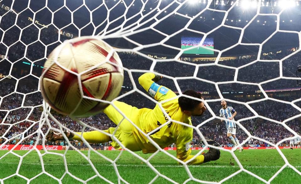 Argentina’s Lionel Messi scores a penalty during the penalty shootout past France’s Hugo Lloris (REUTERS)