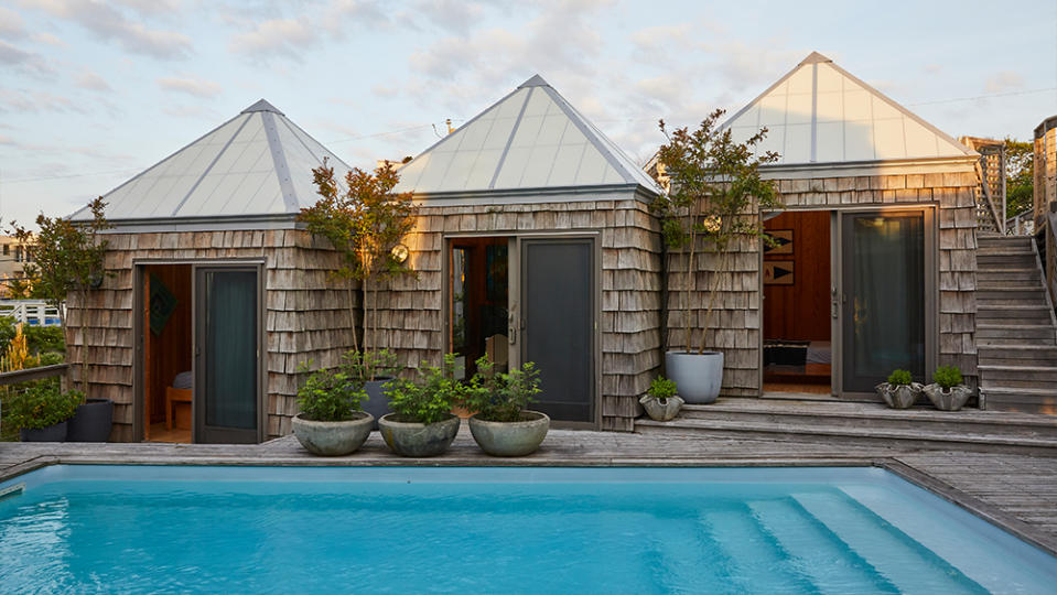 The trio of pyramid-shaped additions housing two bedrooms and a bath.
