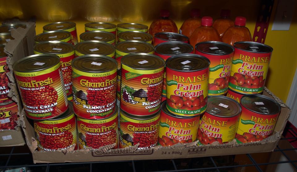 The products on this shelf are made from the African palmnut. According to Sola Ajao, owner of the new Destiny African Market in Randolph, palmnut products have also been used as medicine such as treating eczema and poison ingestion.