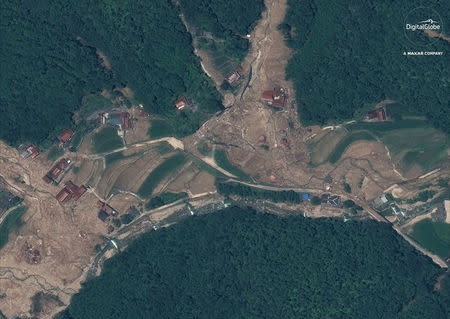 A satellite image of "after the floods" damage to homes and roads south of Enshoji, Japan, captured July 10, 2018. Satellite image 2018 DigitalGlobe, a Maxar company/Handout via REUTERS