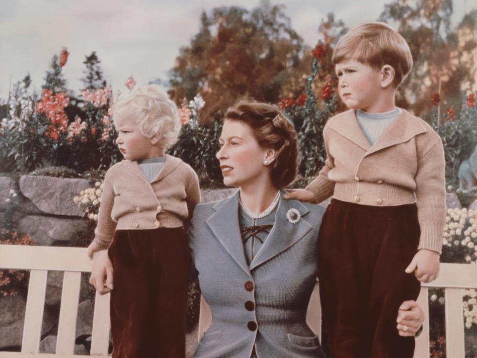 Queen Elizabeth with Prince Charles and Princess Anne at Balmoral Castle