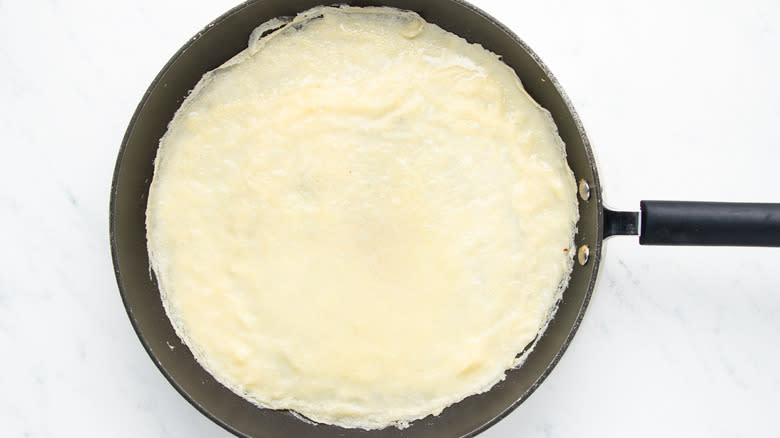 crepe in frying pan