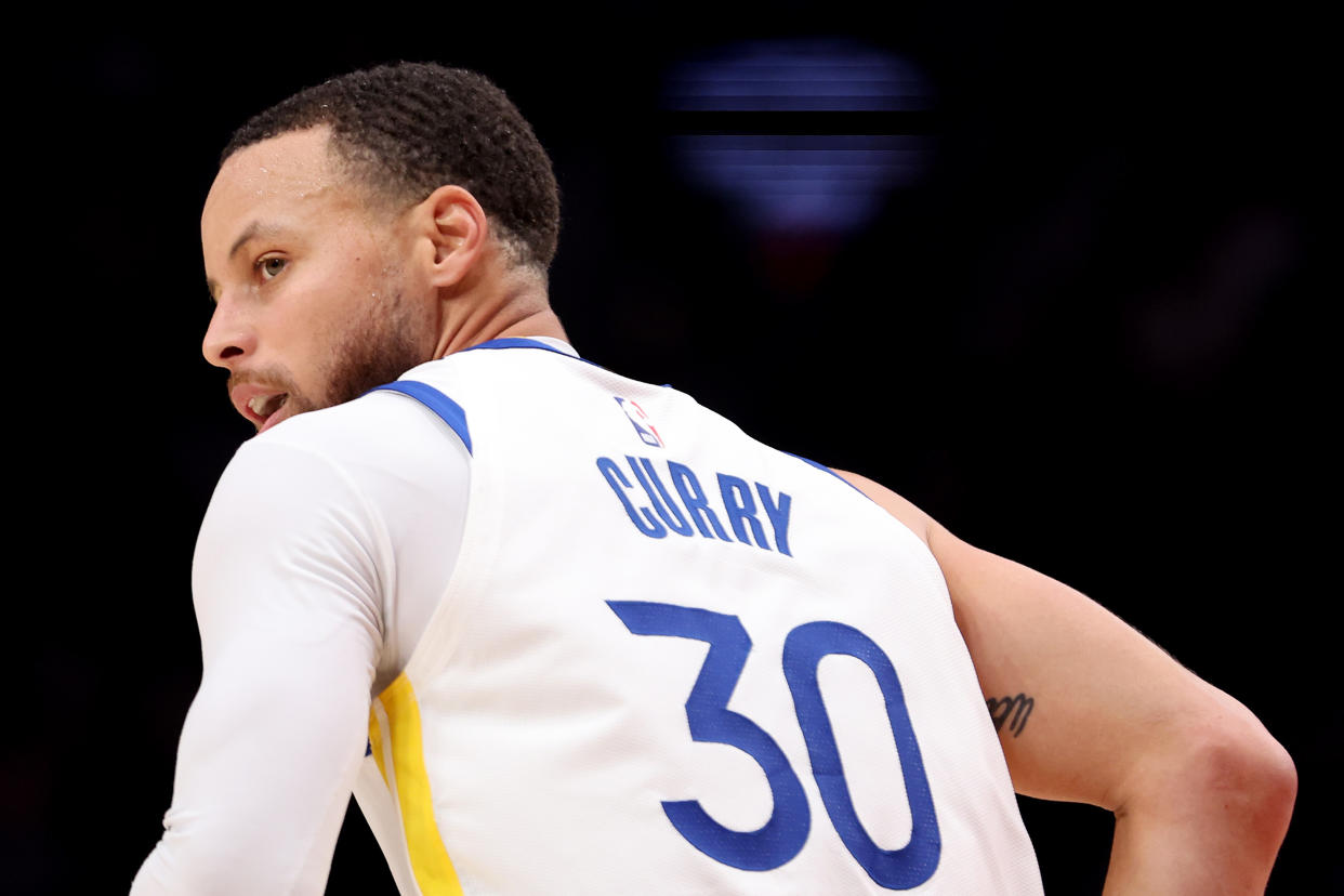 PORTLAND, OREGON - APRIL 09: Stephen Curry #30 of the Golden State Warriors reacts during the second quarter against the Portland Trail Blazers at Moda Center on April 09, 2023 in Portland, Oregon. NOTE TO USER: User expressly acknowledges and agrees that, by downloading and/or using this Photograph, user is consenting to the terms and conditions of the Getty Images License Agreement. (Photo by Steph Chambers/Getty Images)