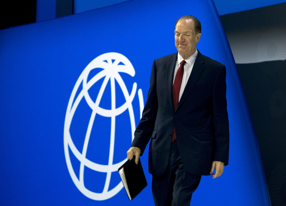 World Bank President David Malpass walks to the podium before he speaks at the opening ceremony of the World Bank/IMF Annual Meetings in Washington, Friday, Oct. 18, 2019. (AP Photo/Jose Luis Magana)