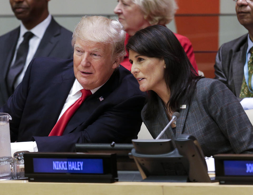 FILE - President Donald Trump speaks with U.S. Ambassador to the United Nations Nikki Haley before a meeting during the United Nations General Assembly at U.N. headquarters, Sept. 18, 2017. Haley, the former South Carolina governor and United Nations ambassador, announced her candidacy for president on Tuesday. (AP Photo/Seth Wenig, File)