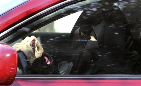 A woman drives a car in Saudi Arabia October 22, 2013. .REUTERS/Faisal Al Nasser