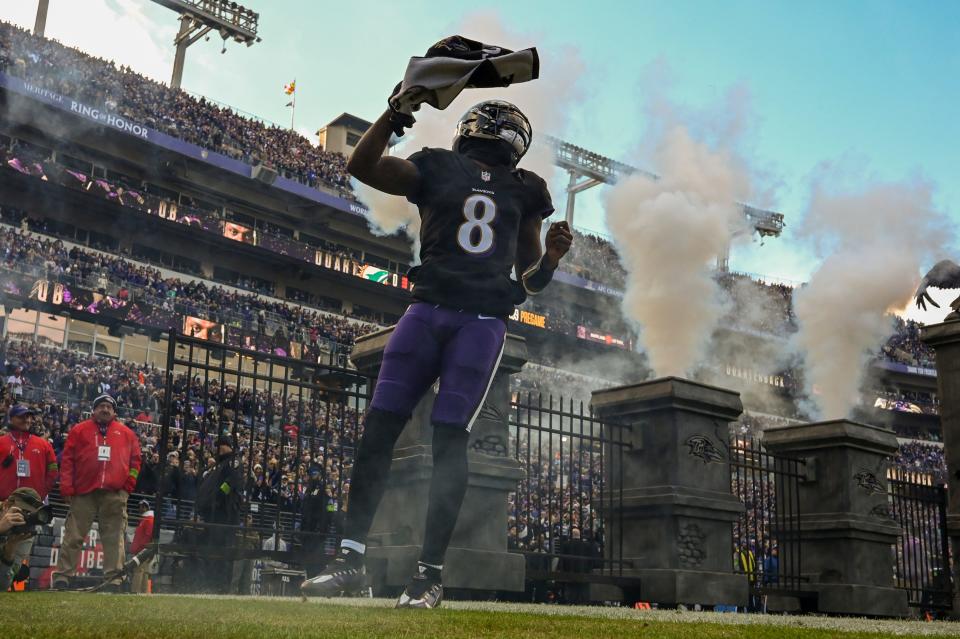 Baltimore Ravens quarterback Lamar Jackson (8) enters the field before the game against the Miami Dolphins at M&T Bank Stadium.