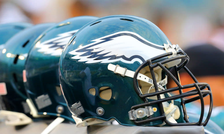 Eagles helmets on the sidelines.