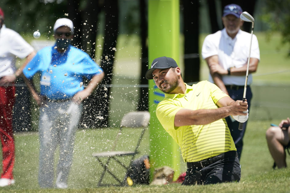 Jason Day, of Australia, hits out of a bunker on the first hole during the first round of the AT&T Byron Nelson golf tournament, Thursday, May 13, 2021, in McKinney, Texas. (AP Photo/Tony Gutierrez)