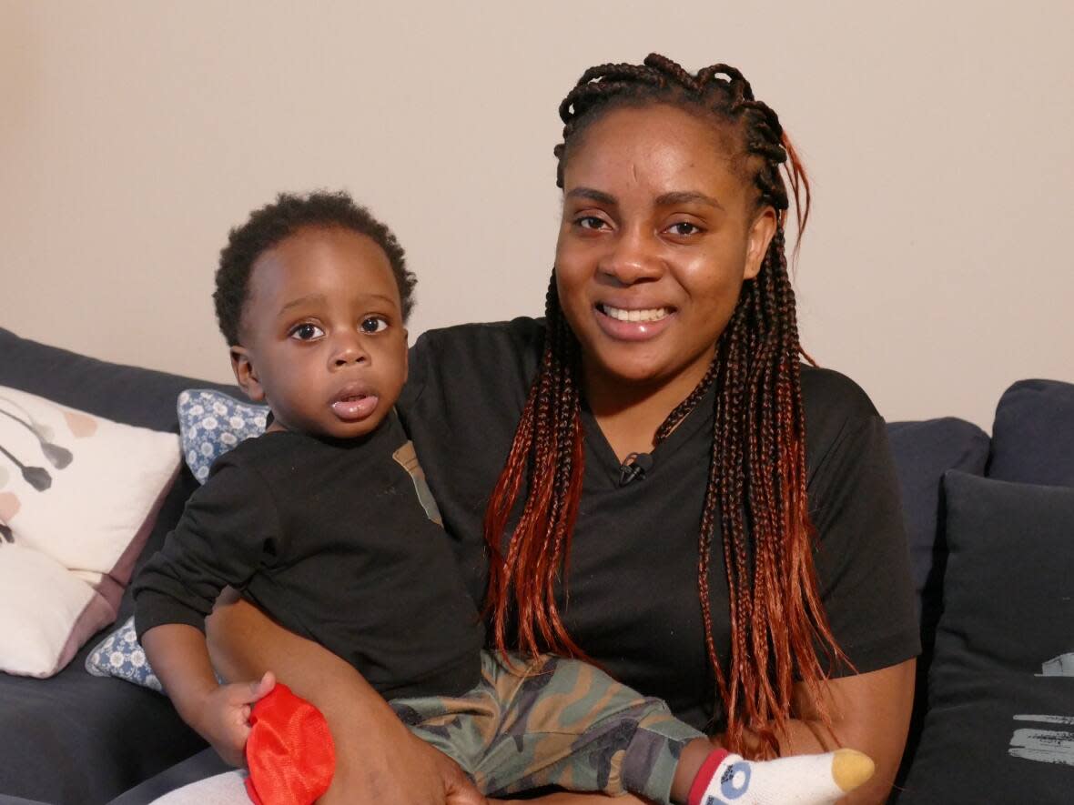 Ololade Fashina, 29, owed almost $35,000 after giving birth to her son Ayodeji in 2021 after her international student insurance lapsed. After CBC News made inquiries into her situation, Manitoba Blue Cross offered to cover her medical expenses.  (Jeff Stapleton/CBC - image credit)