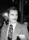 <p>Reynolds attends the premiere of <em>Lucky Lady</em> on December 11, 1975 at the Ziegfeld Theater in New York City. Check out that apple tie and those wide lapels. *chef's kiss*</p>