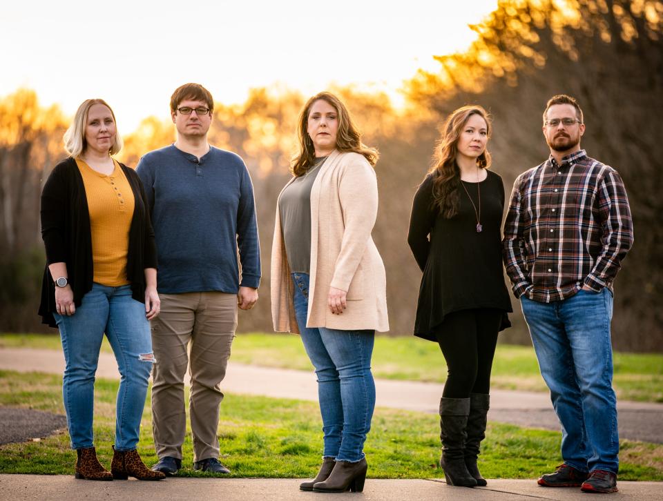 From left, Amy Fritz, Nathan Fritz, Melissa Hogan, Lauren Thoman, and Greg Thoman, pose for a portrait in Franklin, Tenn., Wednesday, Jan. 5, 2022. The group of former employees and spouses of former employees of Ramsey Solutions decided to speak up about their experiences with the company. 