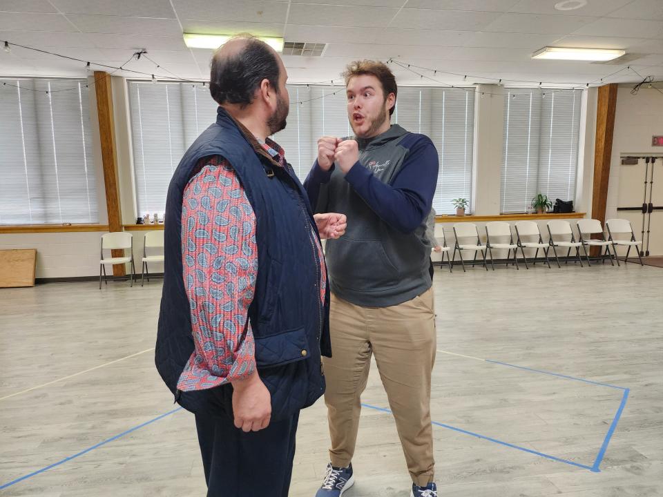 Amarillo Opera cast members Eric Barry as the Duke of Montua, left, and Chancelor Barbaree as Marullo rehearse for the upcoming production of Verdi's "Rigoletto." The production will be held April 1 in the Globe-News Center for the Performing Arts.