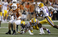 Texas Longhorns quarterback Sam Ehlinger #11 looks for running room around LSU Tigers defenders Saturday Sept. 7, 2019 at Darrell K Royal-Texas Memorial Stadium in Austin, Tx. LSU won 45-38. ( Photo by Edward A. Ornelas )