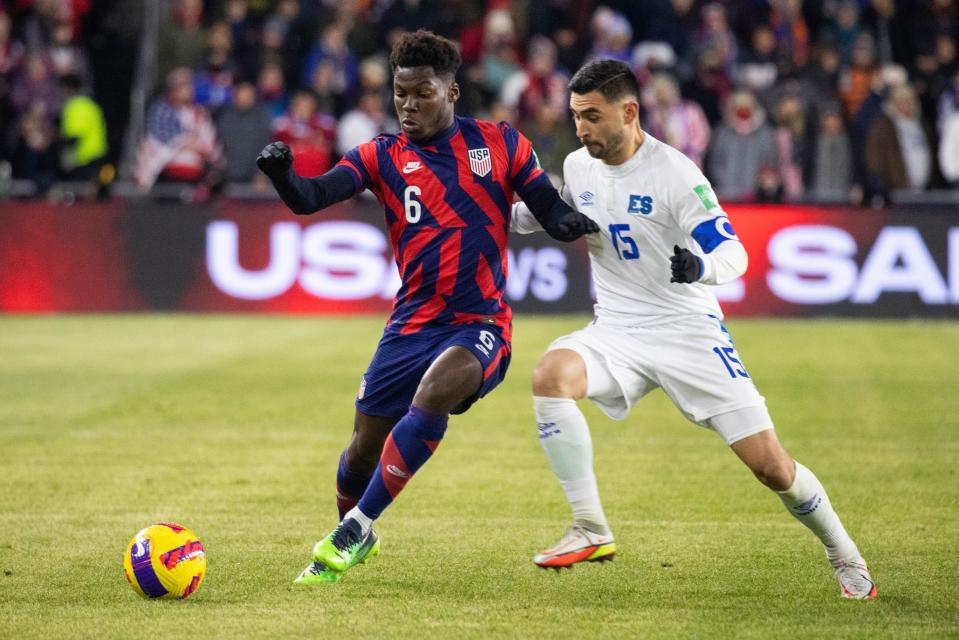 United States midfielder Yunus Musah (6) dribbles the ball against El Salvador midfielder Alexander Roldan during a Concacaf FIFA World Cup Qualifier soccer match at Lower.com Field on Jan. 27, 2022.