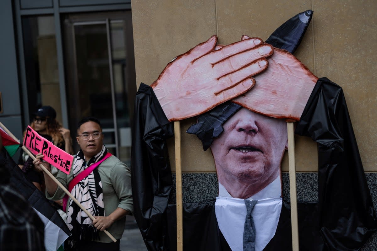 Protesters demonstrate outside a federal courthouse in Oakland, California, where a group of Palestinian plaintiffs and aid groups are asking a judge to block the Biden administration’s support for Israel’s campaign in Gaza.  (REUTERS)