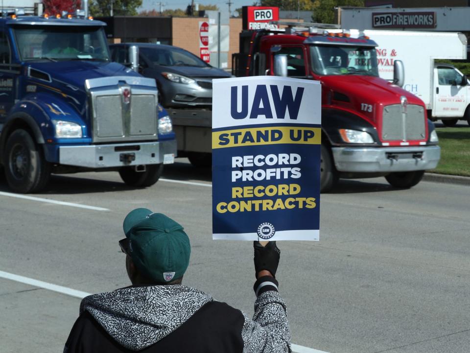 UAW members at the Stellantis' Sterling Heights Assembly Plant picket along Van Dyke Road in front of the facility Monday, Oct 22, 2023.