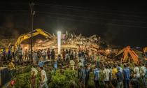 MUMBAI, INDIA - AUGUST 24: Rescue workers search for survivors in the debris after a five-story building collapsed in Mahad of Raigad district in the western state of Maharashtra, India on August 24, 2020. (Photo by Imtiyaz Shaikh/Anadolu Agency via Getty Images)