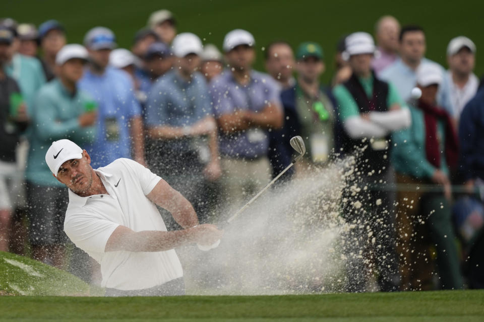 Brooks Koepka hits from the bunker on the second hole during the second round of the Masters golf tournament at Augusta National Golf Club on Friday, April 7, 2023, in Augusta, Ga. (AP Photo/David J. Phillip)