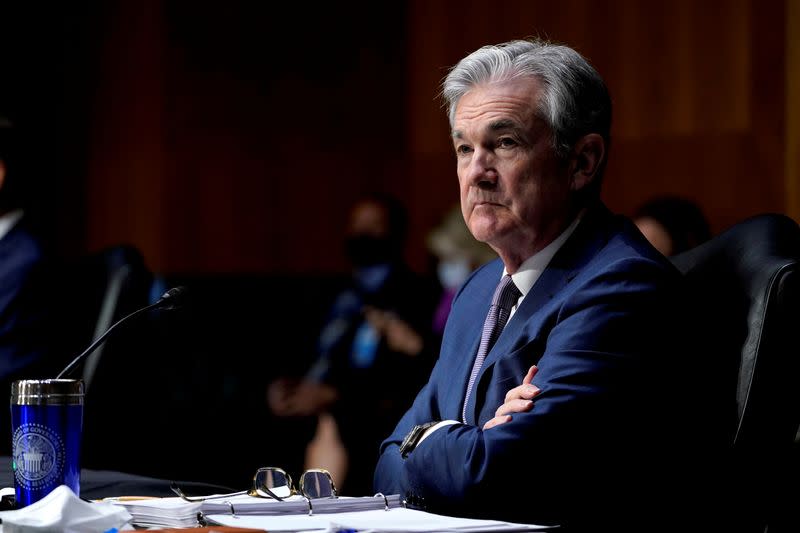 Federal Reserve Chair Jerome Powell listens during a Senate Banking Committee hearing in Washington