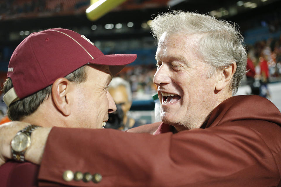 John Thrasher (R) celebrates a win over Miami with Florida State coach Jimbo Fisher. (Getty)