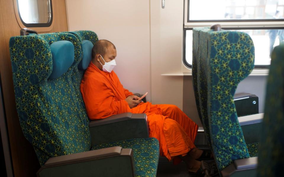 monk on train -  PHOONSAB THEVONGSA/ REUTERS