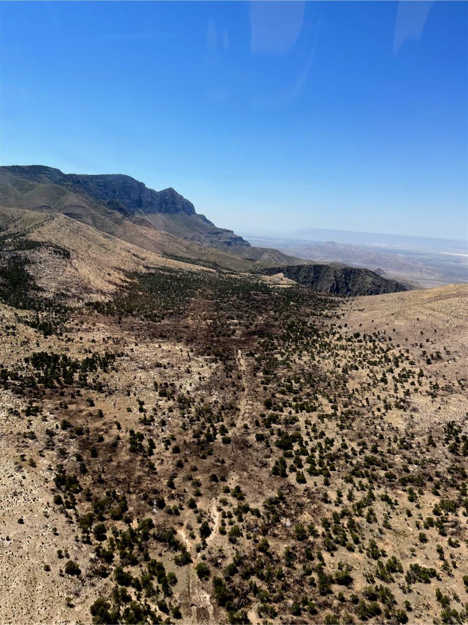 An aerial exploration looks south towards the Cutoff Ridge Fire on July 21,2023. The fire was 100 percent contained on July 24, 2023.