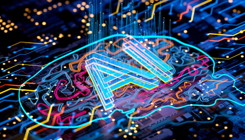 A graphic of a brain with the letters AI in the middle, printed on a circuit board.