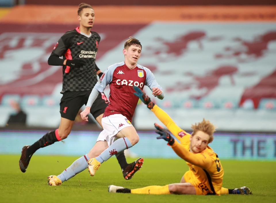 Aston Villa forward Louie Barry scores against Liverpool (Getty)