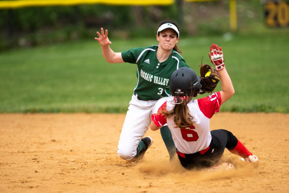 Passaic Valley vs. Lakeland in the Passaic County softball tournament final at Independence Park in Riverdale on Saturday, May 14, 2022. PV #3 Izzy Tiseo tries to get L #6 Julia McCormick out at second. 