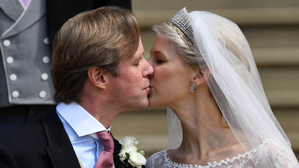 Lady Gabriella Windsor and Thomas Kingston share a kiss on the steps after marrying in St George's Chapel 