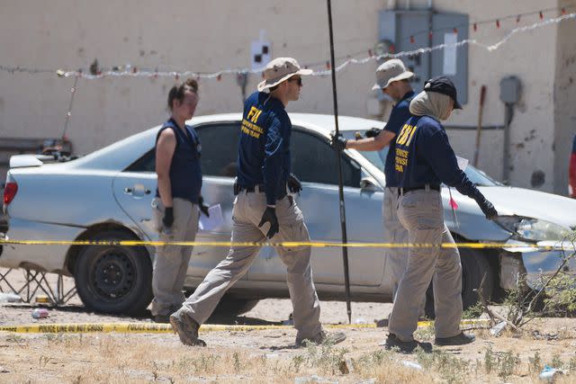 <p>Megan Mendoza/The Republic / USA TODAY</p> FBI investigates at the site of a shooting that took place earlier Saturday morning in a neighborhood in Gila River Indian Community on June 1, 2024.