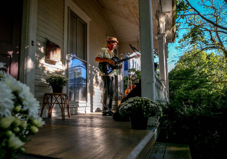 Guitarist Julio Amaro performs in this file photo from 2021. Performers to take the "stage" on front porches up and down High Street in Bristol this Sunday for Arts In Commo's PorchFest 2023.