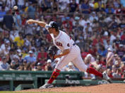 Boston Red Sox pitcher Kutter Crawford delivers to a Tampa Bay Rays batter during the seventh inning of a baseball game at Fenway Park, Monday, July 4, 2022, in Boston. (AP Photo/Mary Schwalm)