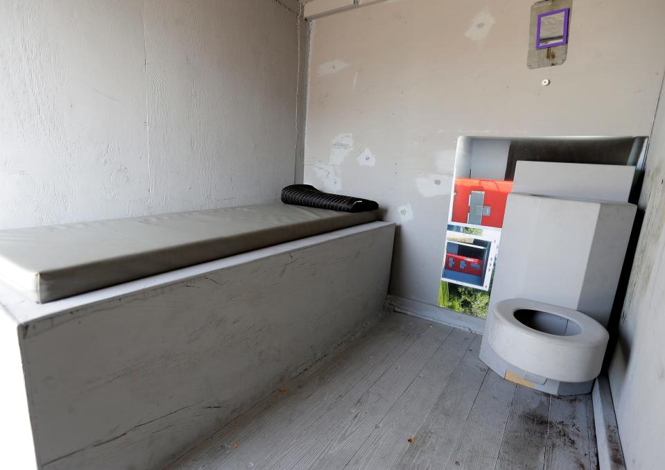 A solitary confinement cell replica is part of a tour event Thursday at St. Joseph Catholic Church in Appleton. The replica cell was part of an awareness event put on by ESTHER/WISDOM as part of their transformational justice campaign.