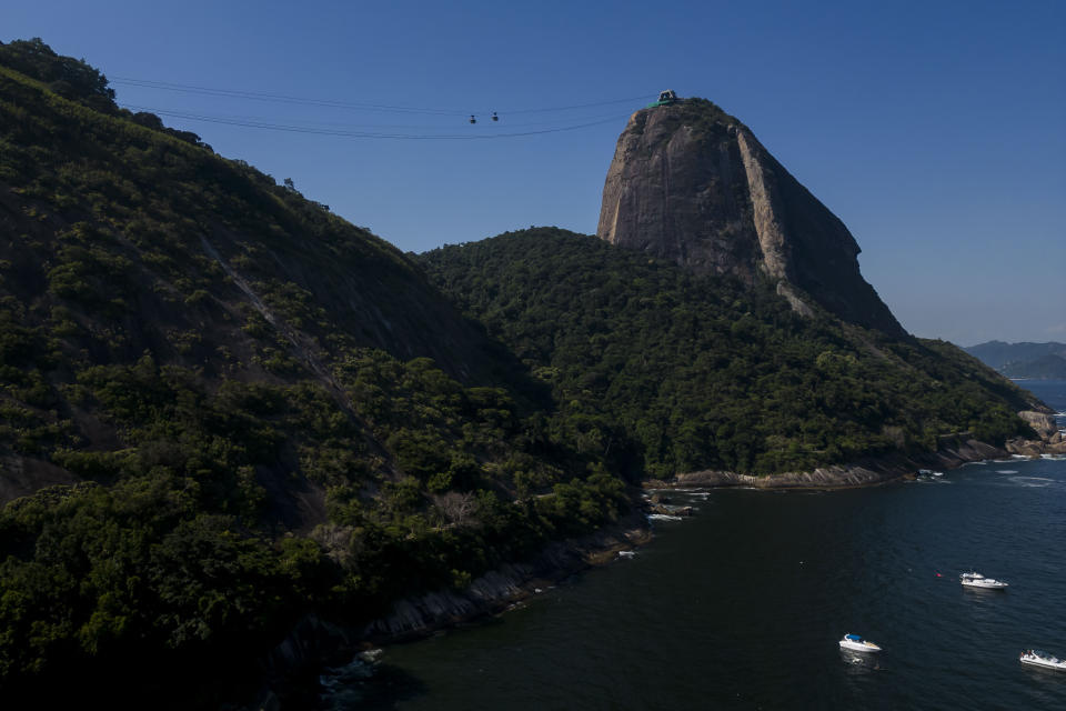 View of Sugar Loaf Mountain on the day that residents and activists protested against the installation of a zip line in the city's icon and UNESCO World Heritage Site, in Rio de Janeiro, Brazil, Sunday, March 26, 2023. (AP Photo/Bruna Prado)