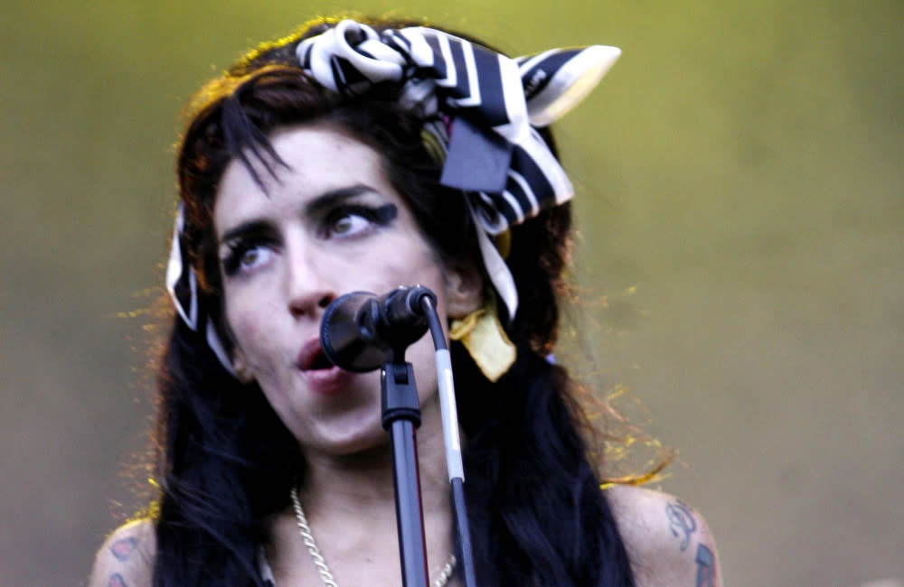 Amy Winehouse compared fame to terminal cancer credit:Bang Showbiz