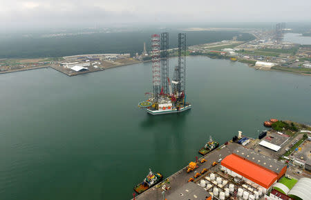 FILE PHOTO: An aerial view shows a new KFELS B Class jackup rig acquired by state-owned petroleum giant Pemex during the 77th anniversary of the nationalization of Mexico's oil at the port of Dos Bocas in the Mexican state of Tabasco in this March 18, 2015 picture provided by the Presidency of Mexico. Presidency of Mexico/Handout/File Photo via Reuters