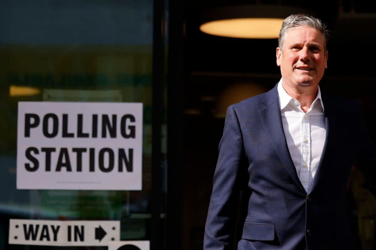 Opposition Labour party leader Keir Starmer leaves a polling station  (AFP)