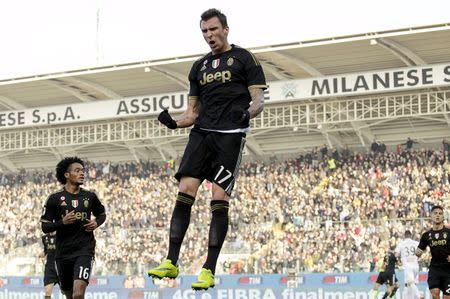 Football Soccer - Carpi v Juventus - Braglia stadium, Modena, Italy- 20/12/15 - Juventus' Mario Mandzukic celebrates after scoring a second goal. REUTERS/Alessandro Garofalo