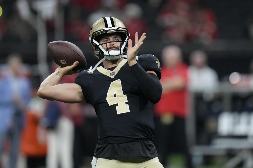 New Orleans Saints quarterback Derek Carr (4) warms up before a preseason NFL football game against the Kansas City Chiefs in New Orleans, Sunday, Aug. 13, 2023. (AP Photo/Gerald Herbert)