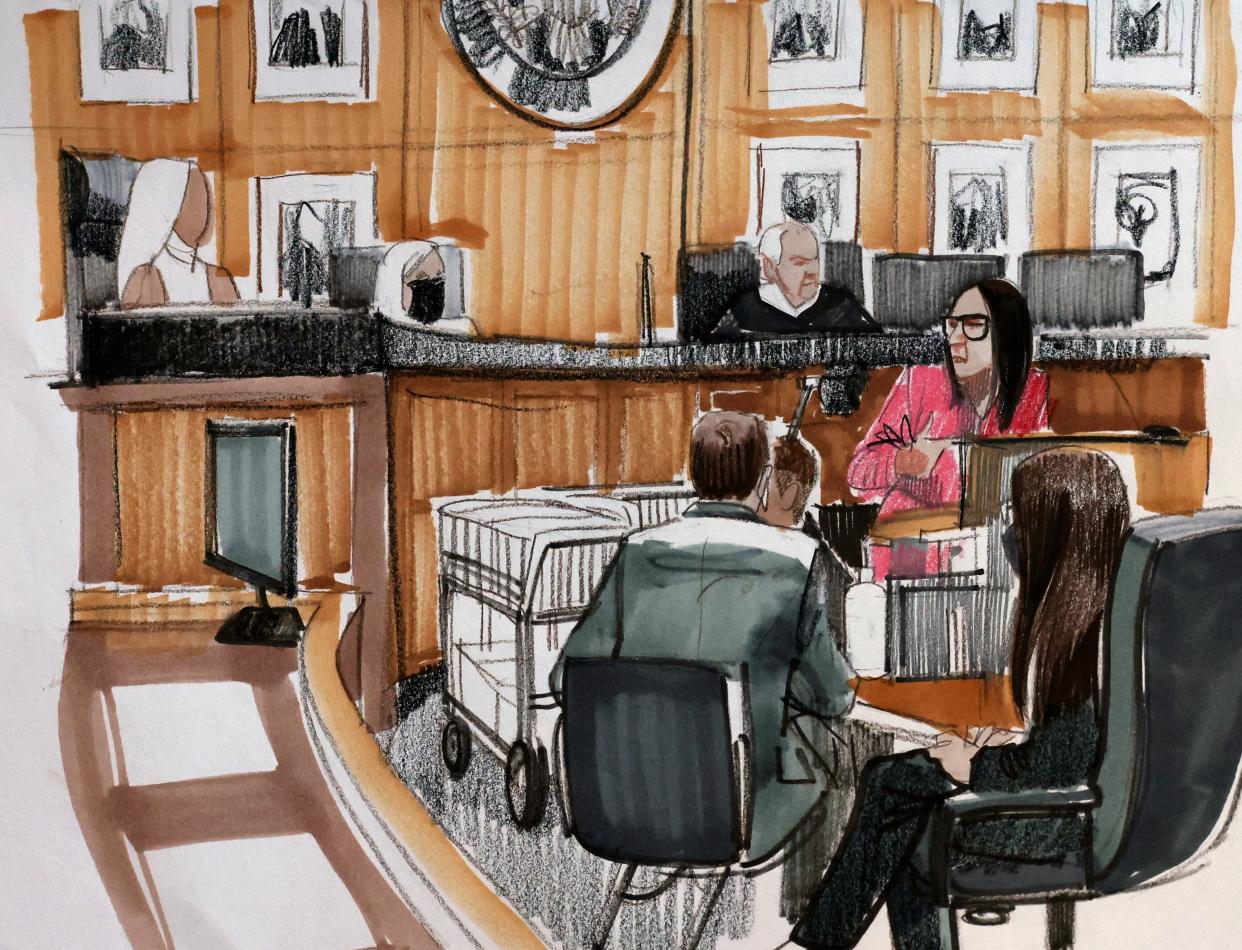 In this courtroom sketch, a woman who went by the pseudonym “Jane” testified in R. Kelly's sex-crimes trial in federal court, Aug. 19, 2022, in Chicago.