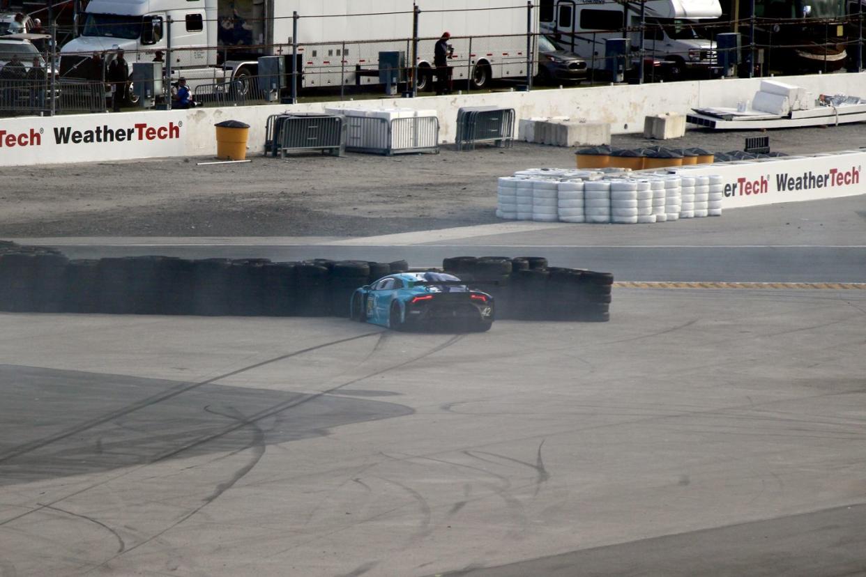 a lamborghini huracan gtd car in a tire barrier