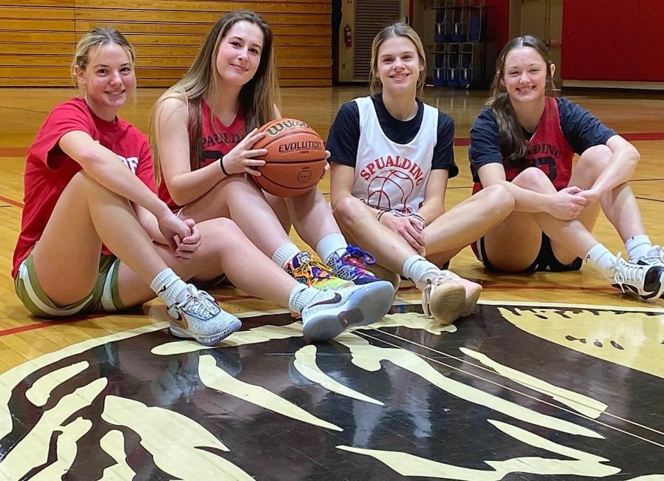 From left, Jenna Philbrook, Jade Trueman, Hannah Drew and Mackenzie Brochu all are business this season for the Spaulding High School girls basketball team. Philbrook, Trueman and Brochu were all part of Spaulding's 2020 championship team as freshmen, and want to return to the Division I semifinals this season.