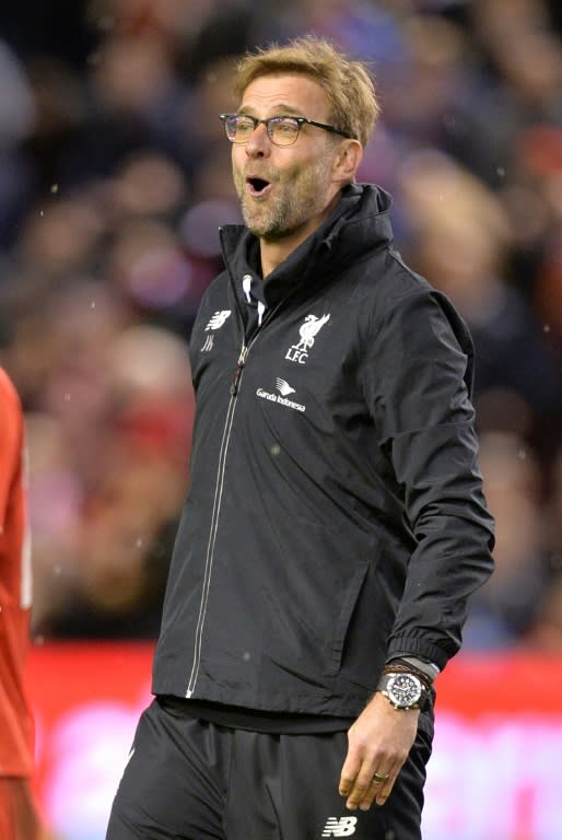 Liverpool's new manager Jurgen Klopp is battling to restore the once-mighty team's fortunes on the pitch